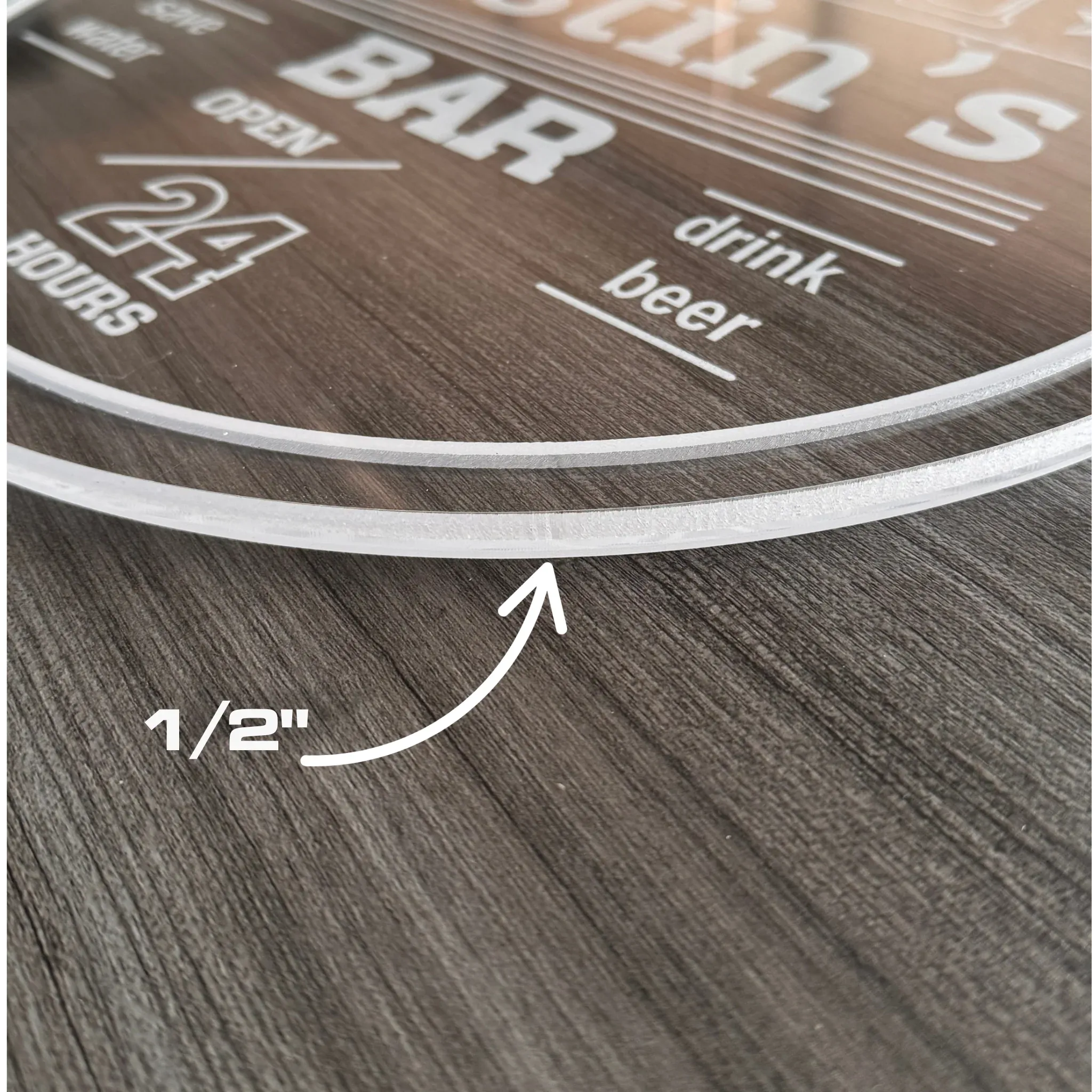 Close-up of a 1/2 inch thick premium acrylic man cave sign showing the durable laser-cut edge and engraved bar details.